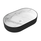 Otti Kensington Oval Above Counter Basin 560x350x120mm Matte Black & Matte White Carrara OT5635BWCAR